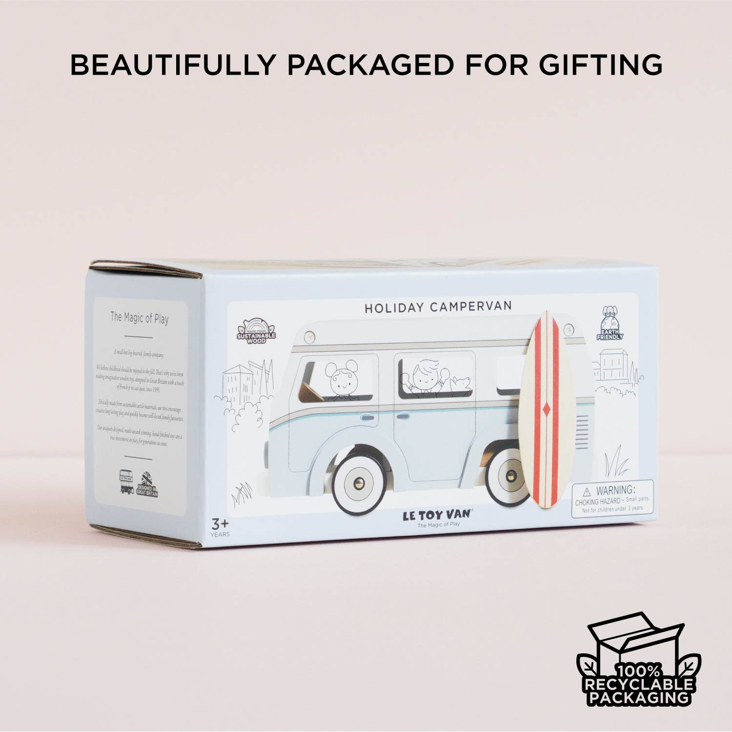 Toy campervan packaging with '100% Recyclable Packaging' label on a beige background