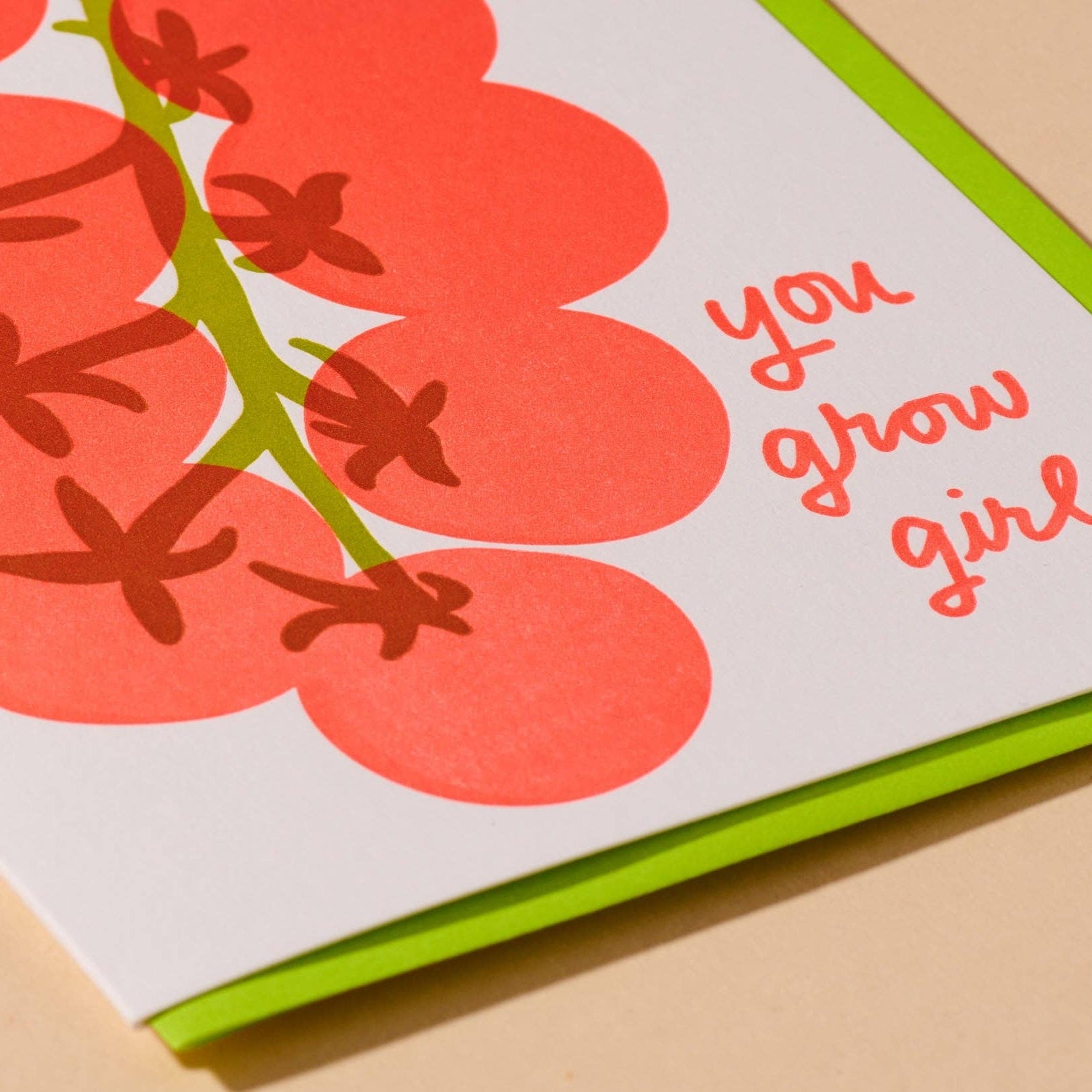 Card with red grapes illustration and 'you grow girl' text on a beige background