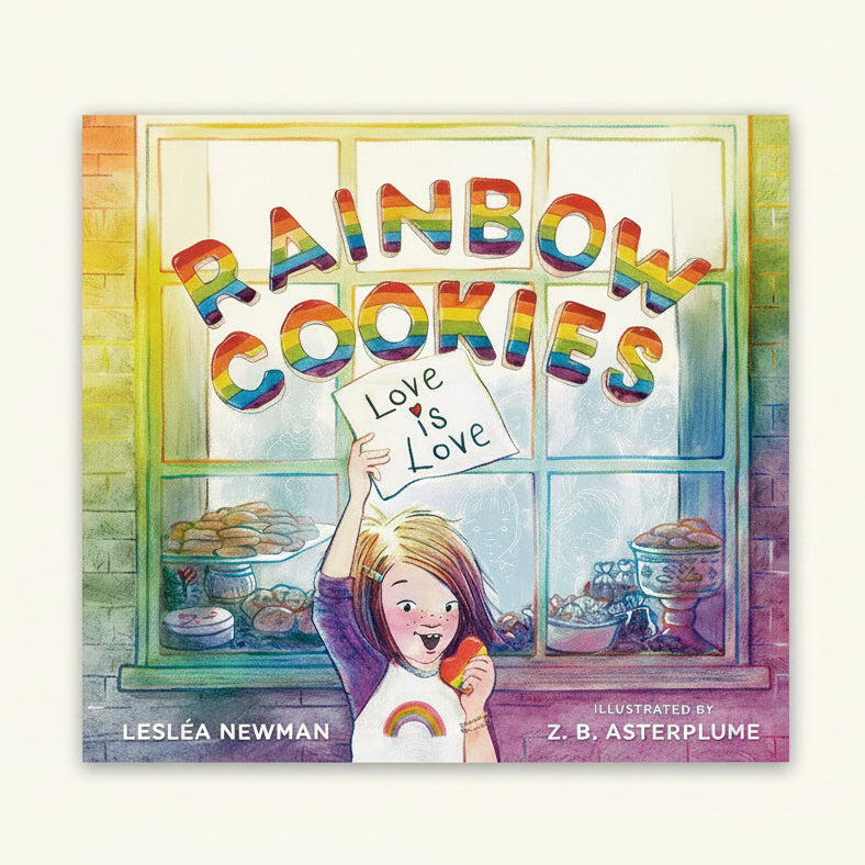All This Fuss Over a Cookie?! Every month Ms. Madeleine creates a special cookie of the month for her bakery. And her best customer, a little girl named Cookie, is always the first to try it. Ms. Madeleine’s sweet treats never disappoint.
When June arrives, Cookie and her two moms stop in and taste the best cookie yet: a heart-shaped, rainbow-striped, crunchy, frosted confection that Ms. Madeleine baked especially for Pride. But Rainbow Cookies make some people in the neighborhood angry…