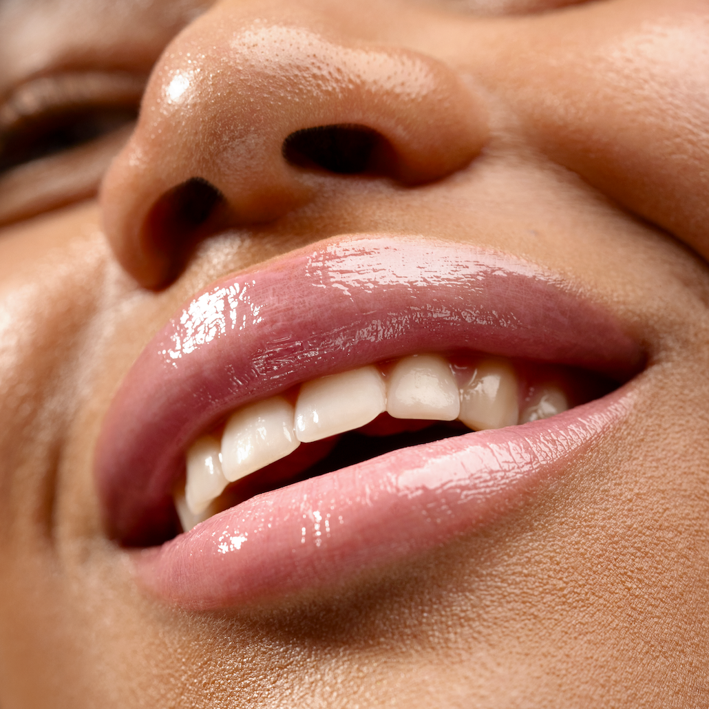 Close-up of a person's lips with a focus on the skin texture.