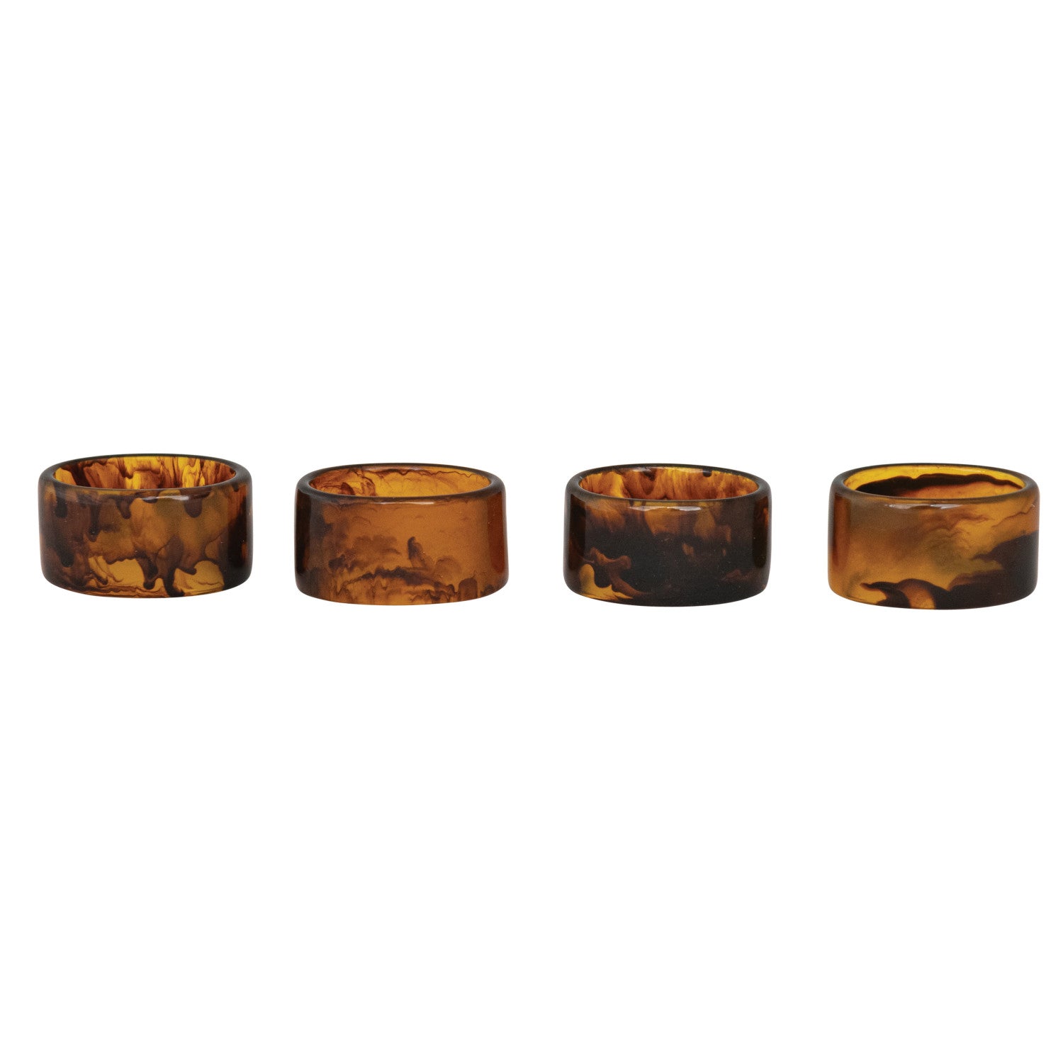 Add a touch of whimsy to your table with this set of four napkin rings, each featuring a unique tortoise shell finish. No two are alike, making every place setting a fun surprise. Perfect for brightening up dinners and sparking conversation! 2"L x 1-1/4"H
