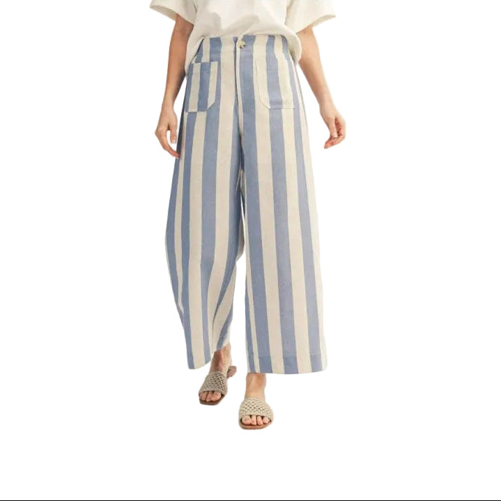 Person wearing blue and white striped pants on a white background