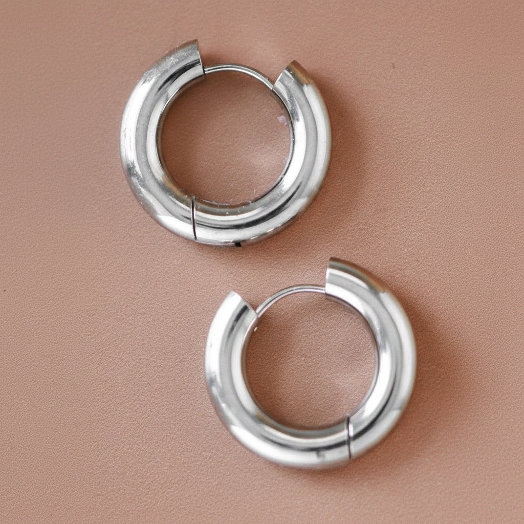 Stainless Steel Chunky Closed Hoops. Approx. 0.95"L These earrings are hypoallergenic, waterproof and tarnish-resistant. To prolong the shine and finish of the plating, contact with chemicals such as lotions, perfumes, and cleaning products should be avoided.