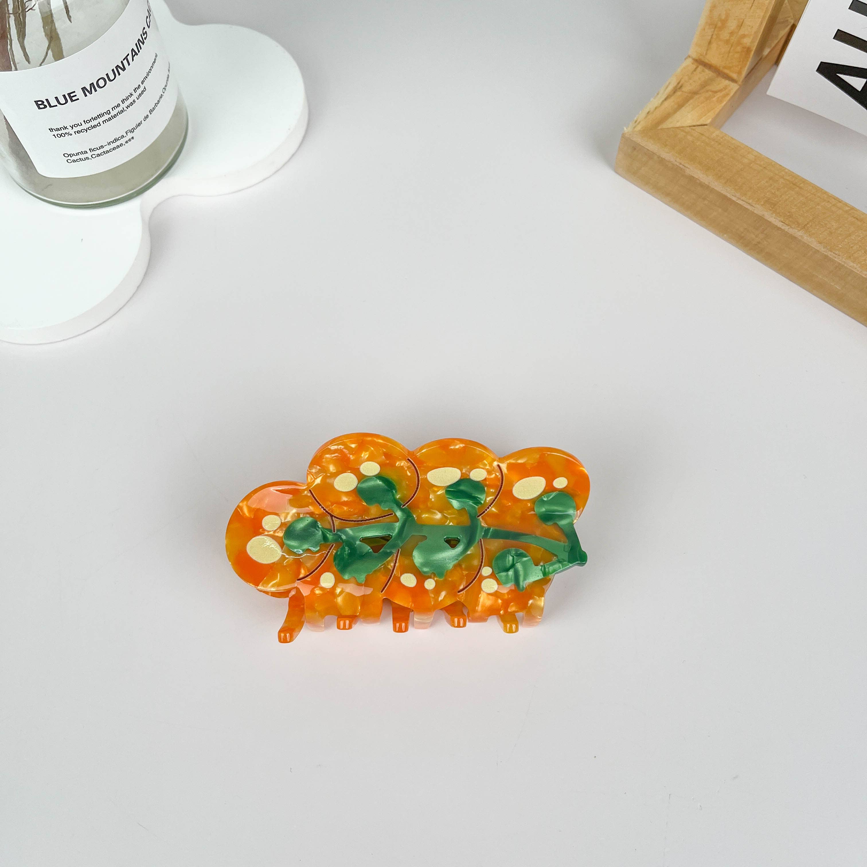 Add a burst of garden-fresh charm to your hairstyle with our Cherry Tomato Hair Claw Clip! This unique hair accessory features a cute cherry tomato design, combining the playful appeal of hair accessories with the vibrant energy of garden fruit.
Crafted from high-quality, durable materials, the clip is lightweight yet sturdy, offering a comfortable fit and a secure hold for all hair types. Whether you're adding a fun touch to a casual look or looking for a quirky accessory for a themed event, this is it!