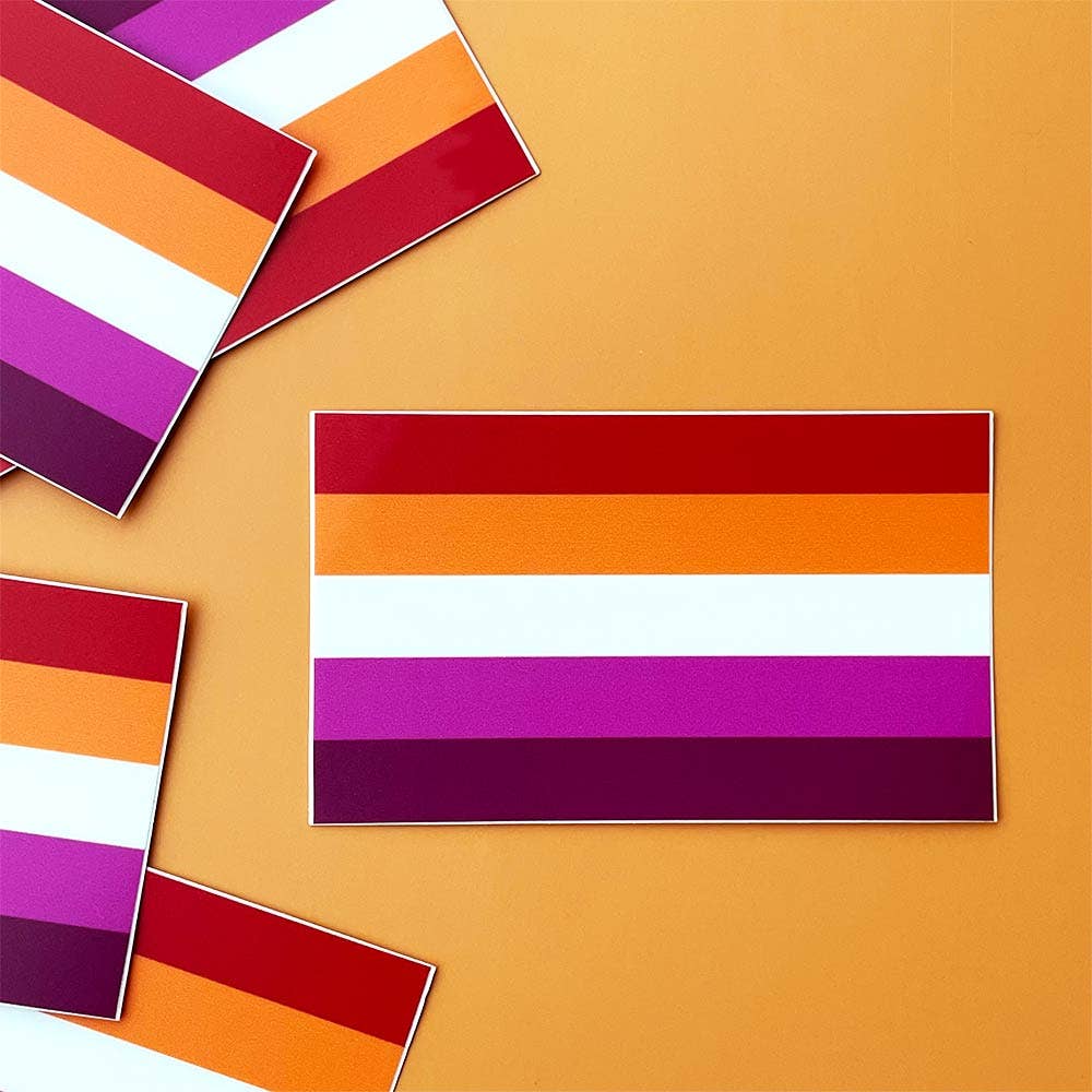 Lesbian Pride Flag sticker ready for sticking on laptops, water bottles, your car, or anywhere else you can think of. A simplified 5 stripe lesbian pride flag, just in sticker form!  3" x 1.8"
