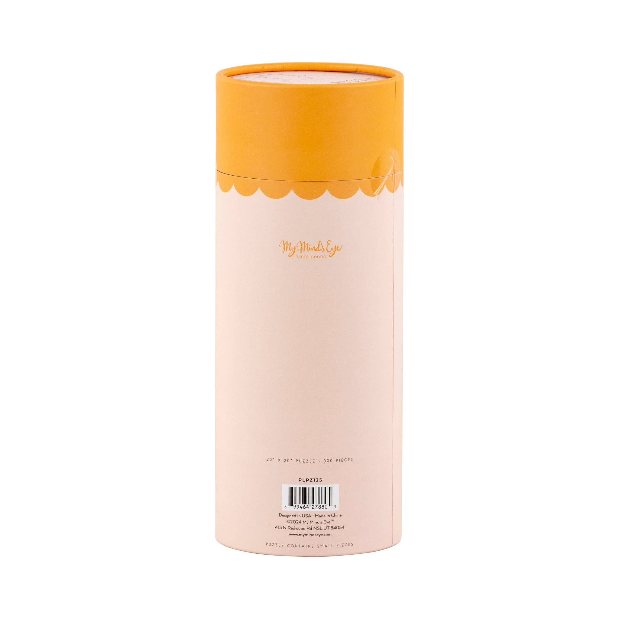 A tall, cylindrical product box in pale blush pink with a bright orange lid and a scalloped orange band near the top. The front has the brand name 'My Melody' printed in gold script, along with a barcode and small text at the bottom.