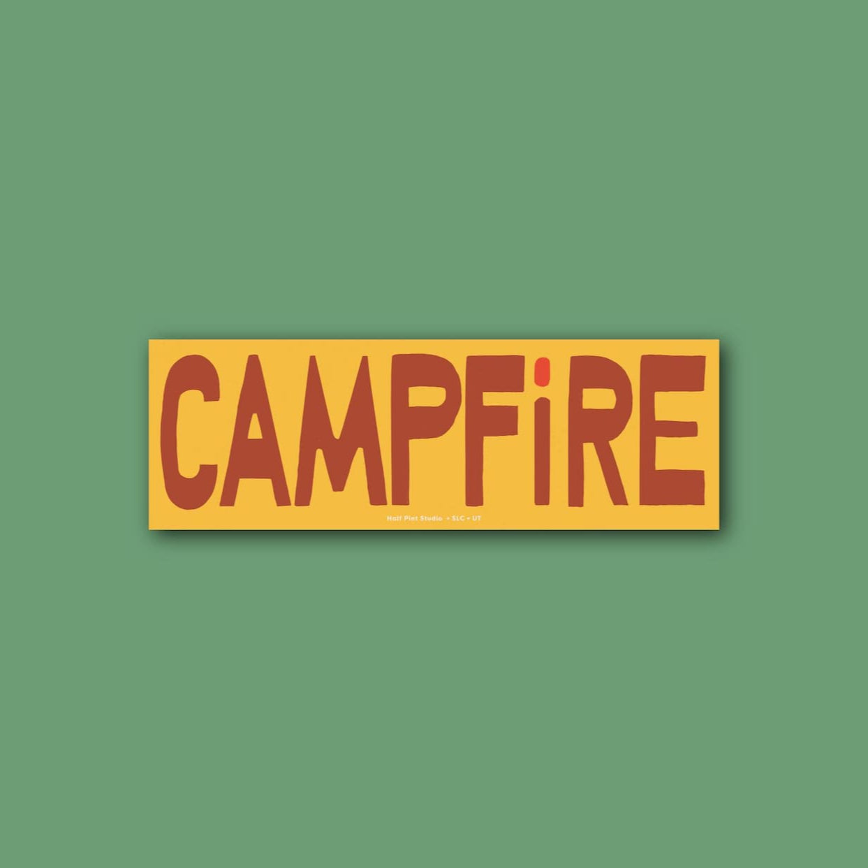 Yellow bumper sticker reading "campfire" in a bright red font