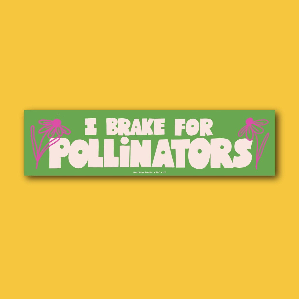 Green bumper sticker reading "I brake for pollinators" with pink flowers