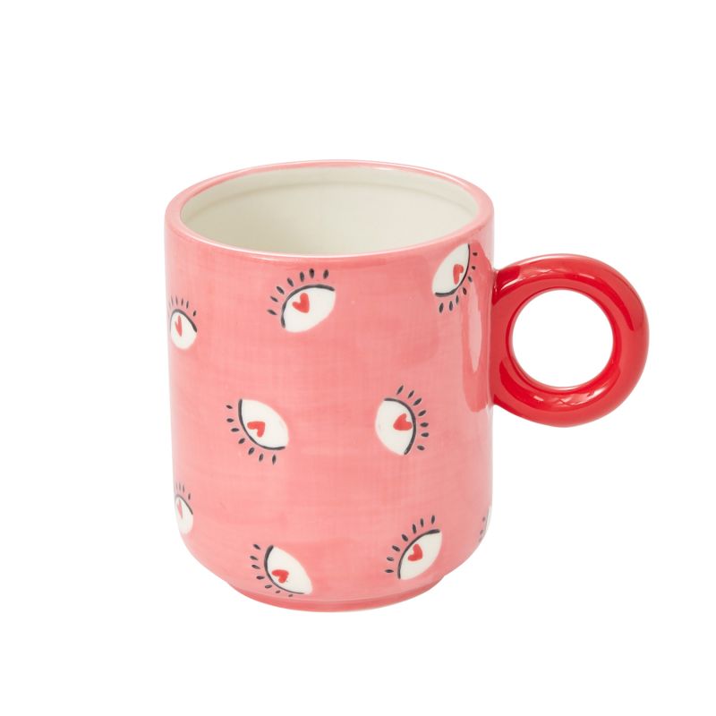 Pink with eyes all over the mug