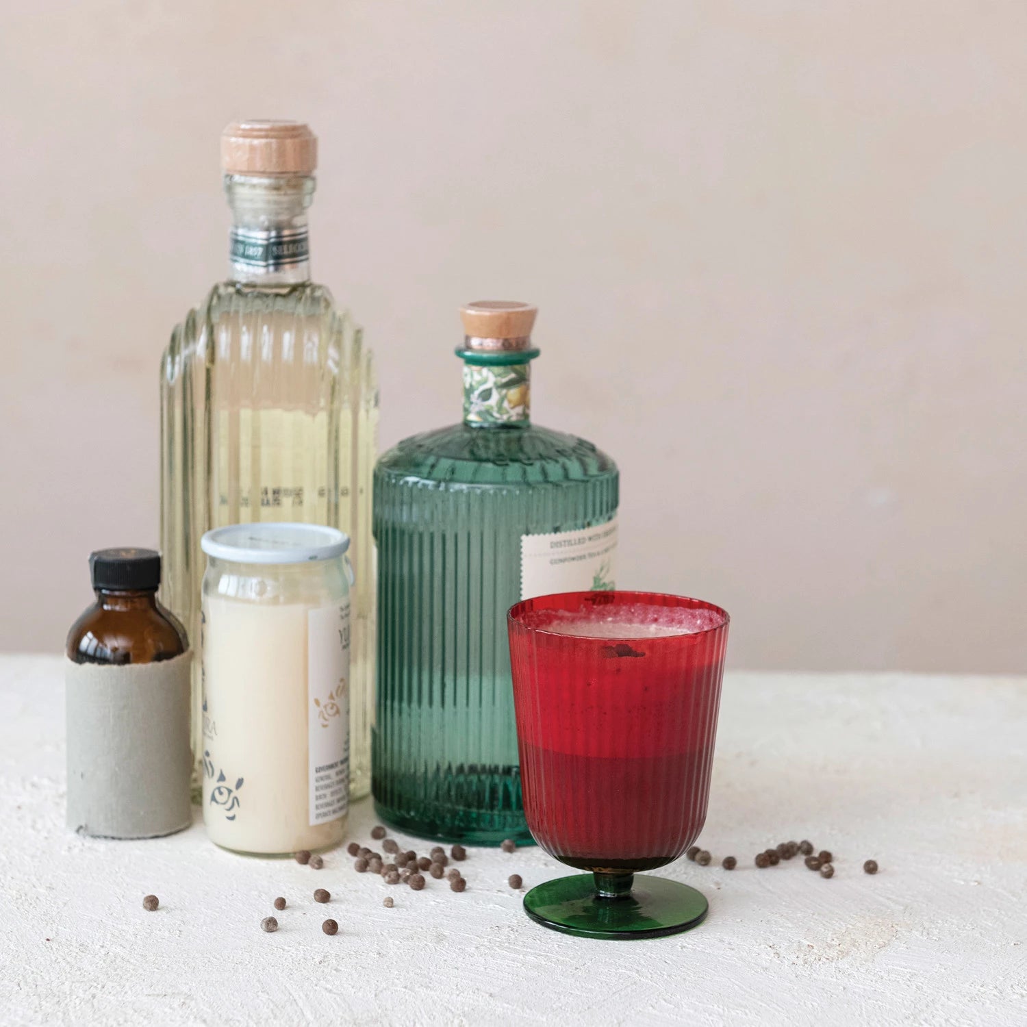 This 8-ounce stemmed drinking glass is a true celebration of color and design, featuring a fluted structure that enhances the visual appeal of any drink. The bold green and red colors wrap around the glass, making it a standout piece for any festive gathering or a lively addition to the glassware collection. Its size is ideal for a variety of drinks, from water to wine, and its durable construction ensures it can be a part of any celebration for years to come.