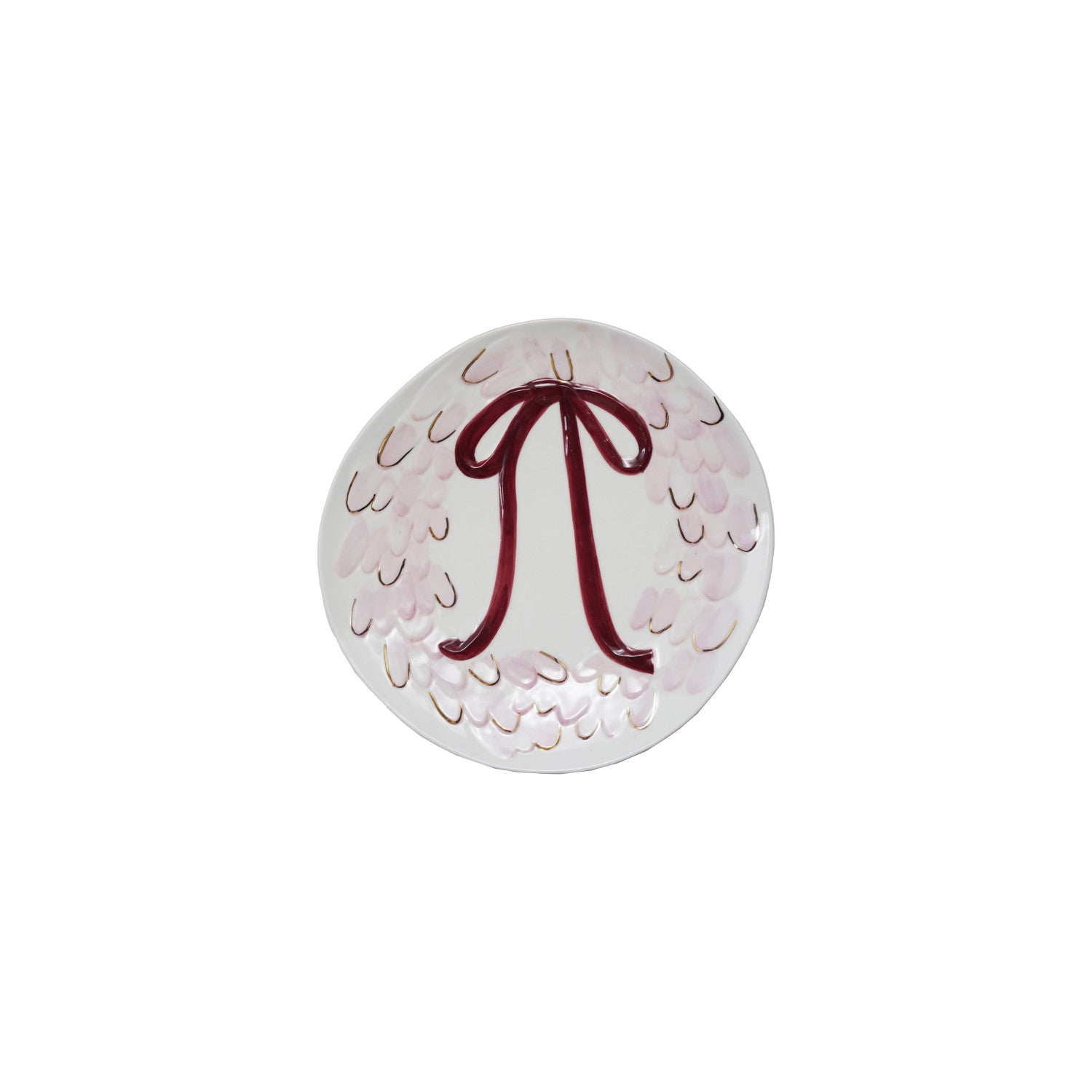 Round decorative item with a red bow design on a white background