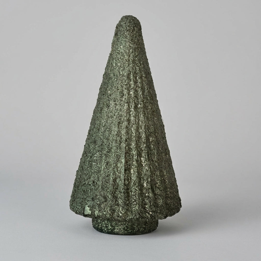 Green Foiled Fluted Glass Tree. Add a touch of vintage elegance and festive warmth to your holiday decor with this Green Foiled Fluted Glass Tree. Beautifully crafted with delicate fluted detailing and a shimmering foiled finish, it creates a cozy, magical glow in any space.