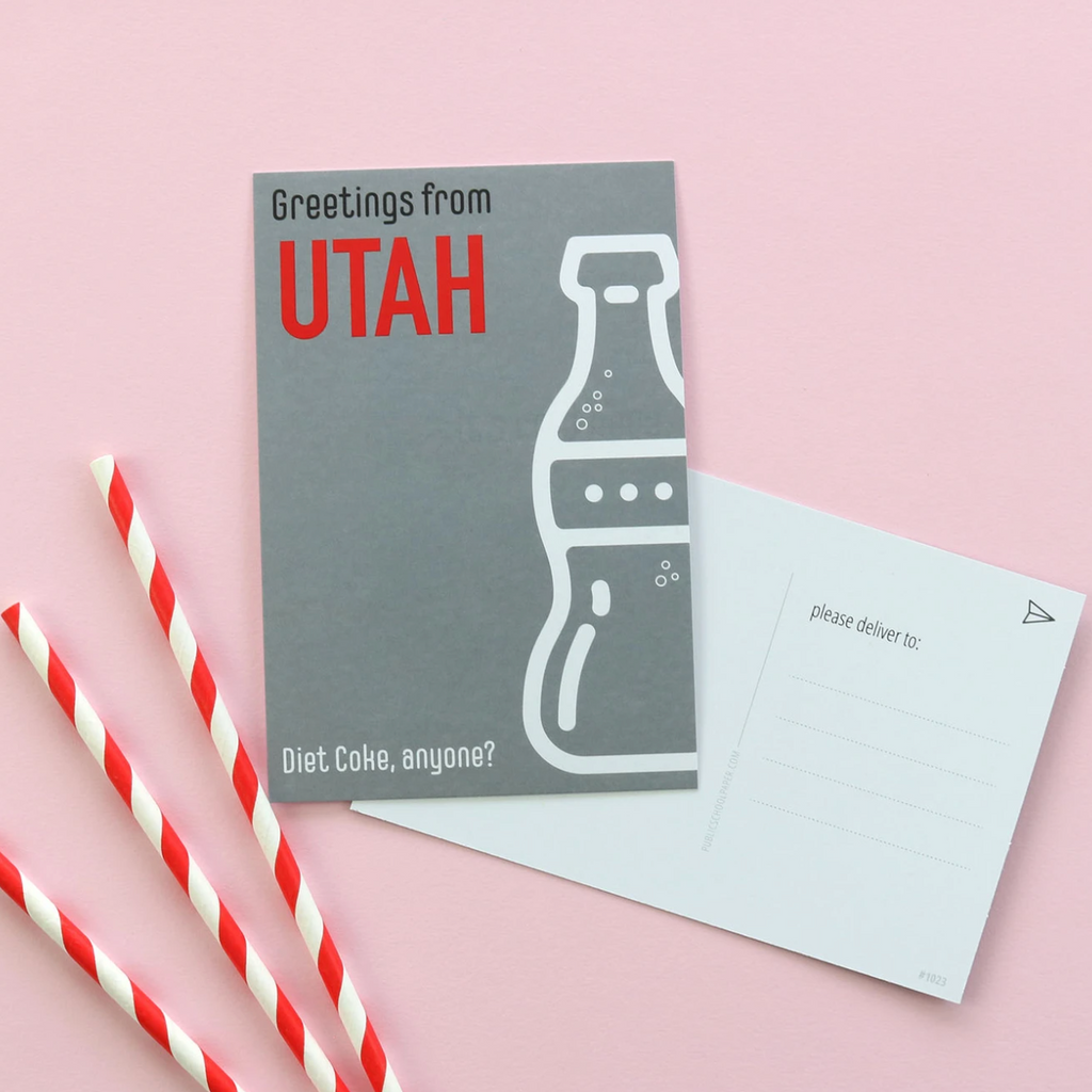 We know you'll think of lots of ways to use these Utah post cards.    Size: 4" x 6"  Address lines and message space on back Set of 10 postcards Designed & Printed in the USA. picture of a Diet Coke bottle on a post card saying "GREETINGS FROM UTAH- DIET COKE ANYONE?