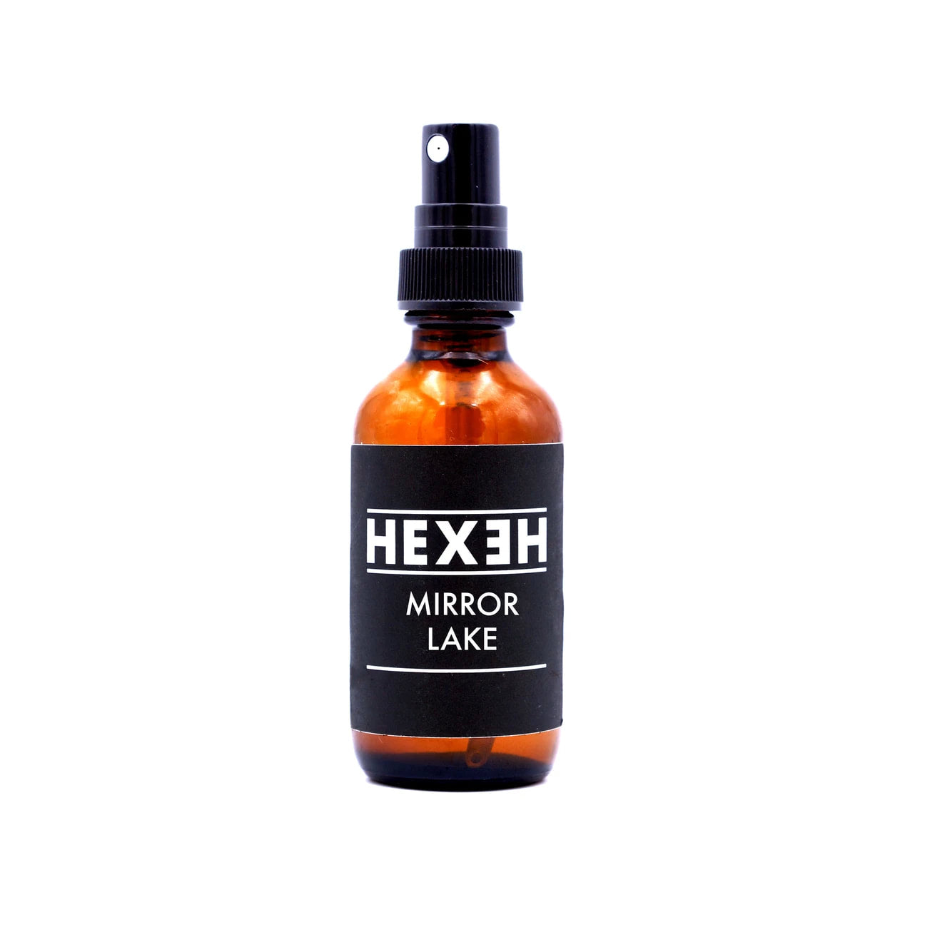 A 2oz amber glass spray bottle labeled 'HEXH MIRROR LAKE' for room spray, positioned against a white background.