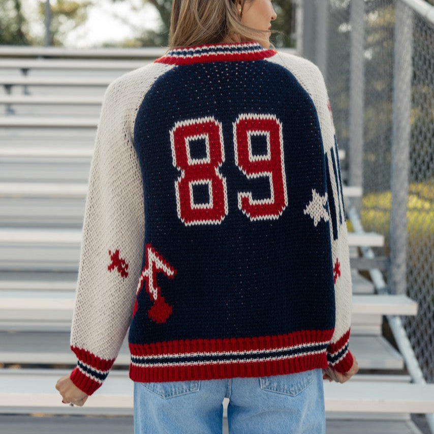 This sporty retro cardigan features a zip front + a letterman design. Perfect for those of us going back to school this year! A chunky knit and oversized fit give this cardi a cool girl look that you'll love this fall!