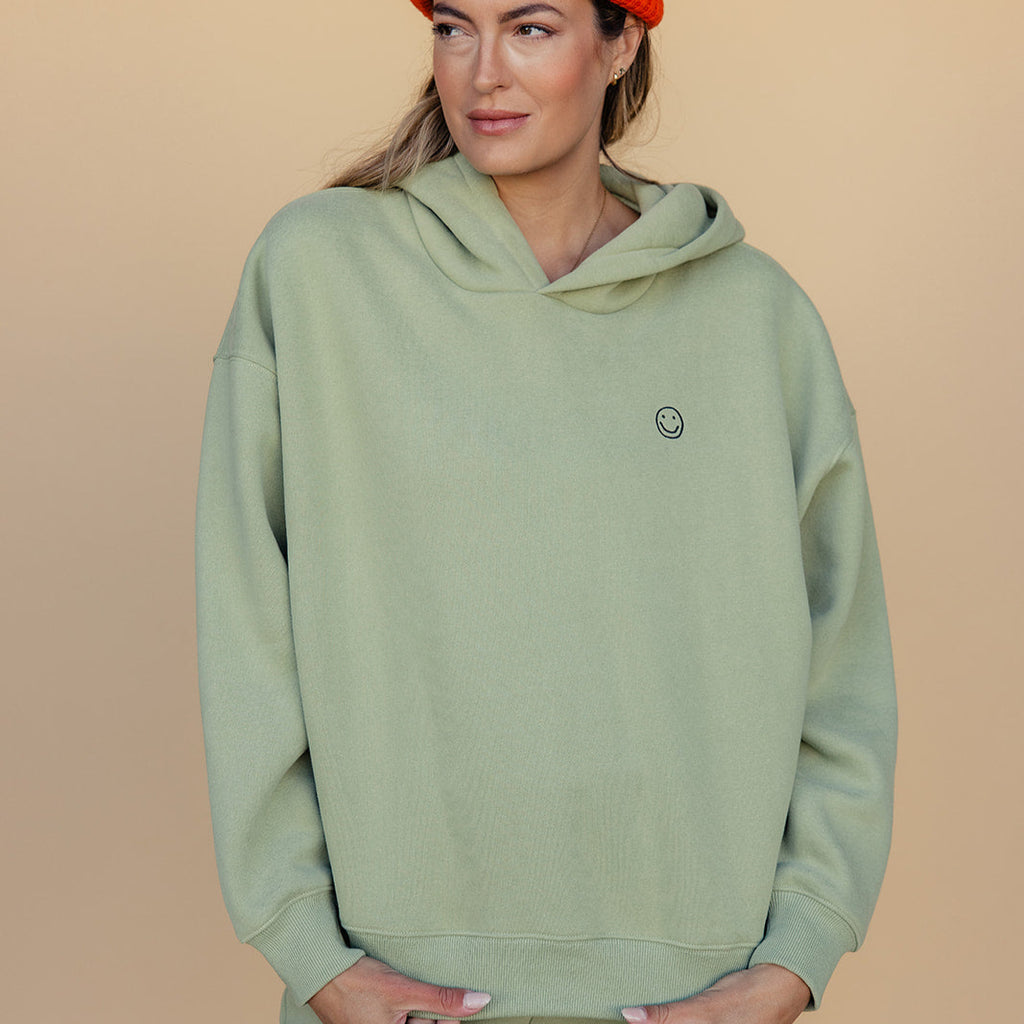My mother told me to pick the very best + this soft, french terry hoodie is it. The embroidered smiley face detail makes this an effortless look with a subtle touch of sunshine. The weather outside might be changing, but we got nothing but smiles here :) Olive