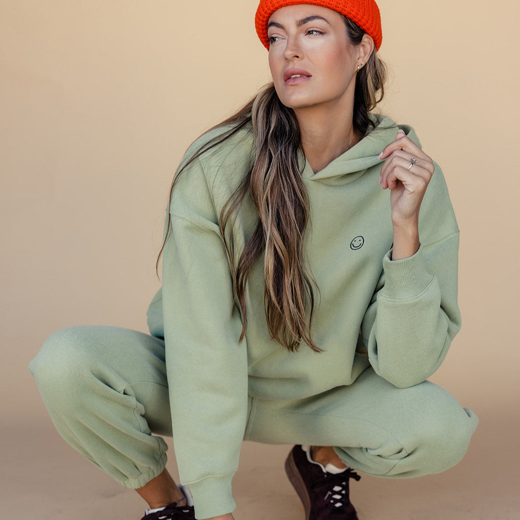 My mother told me to pick the very best + this soft, french terry hoodie is it. The embroidered smiley face detail makes this an effortless look with a subtle touch of sunshine. The weather outside might be changing, but we got nothing but smiles here :) Olive