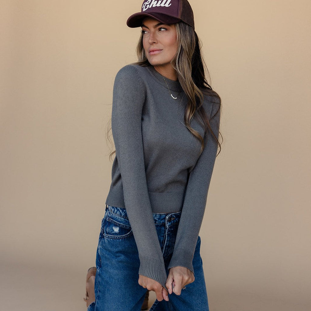 We all love a simple sweater and this one fits the bill! Featuring a crew neckline, slightly cropped fit, and gorgeous color, the We Were Something Sweater is your new staple. Pair it with jeans, skirts, or under your favorite overalls!