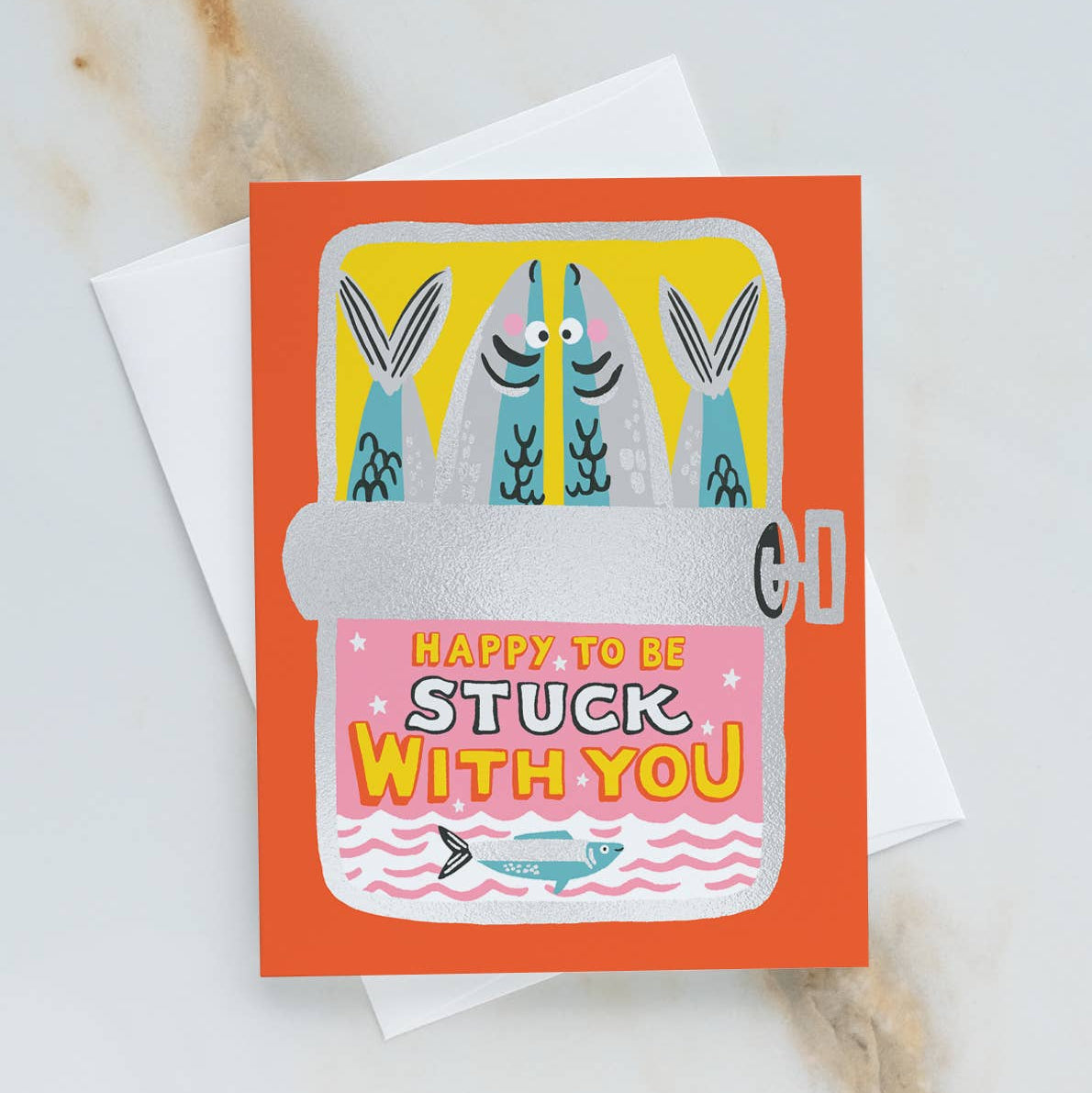 Greeting card with cartoon design of three characters in a locker and text 'Happy to be stuck with you' on an orange background.