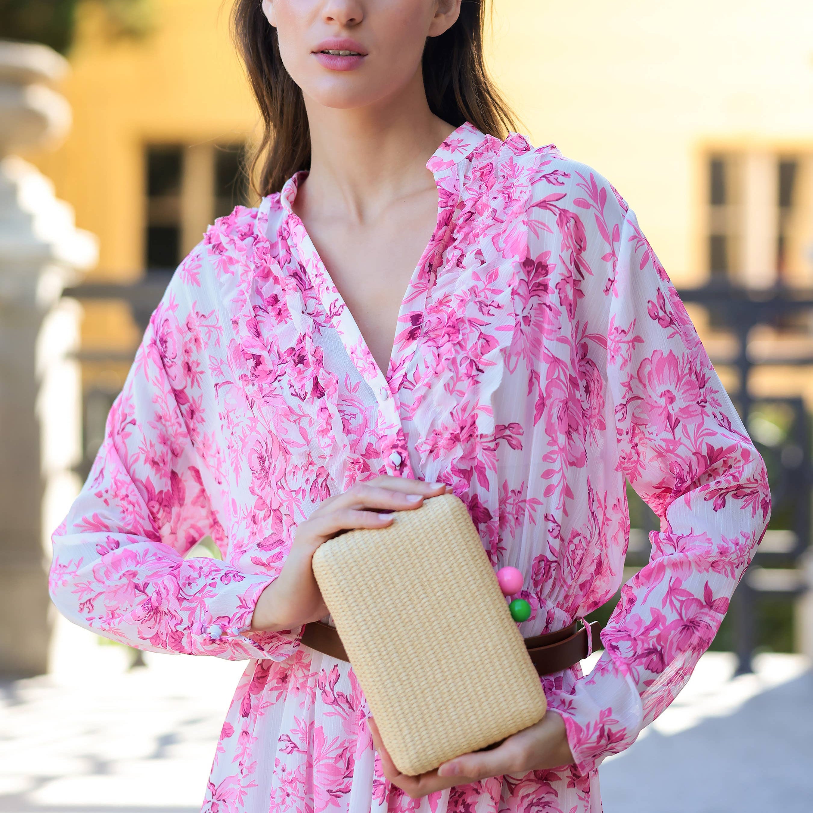Meet the June Minaudière, your new go-to bag for playful elegance. With its compact silhouette, natural hue, and eye-catching color-pop clasp, this piece adds instant fun to any outfit. Handwoven with precision, it’s both lightweight and luxurious, featuring a detachable chain for effortless wear. Whether tucked under your arm or slung casually over your shoulder, the June Minaudière is the statement accessory you never knew you needed.