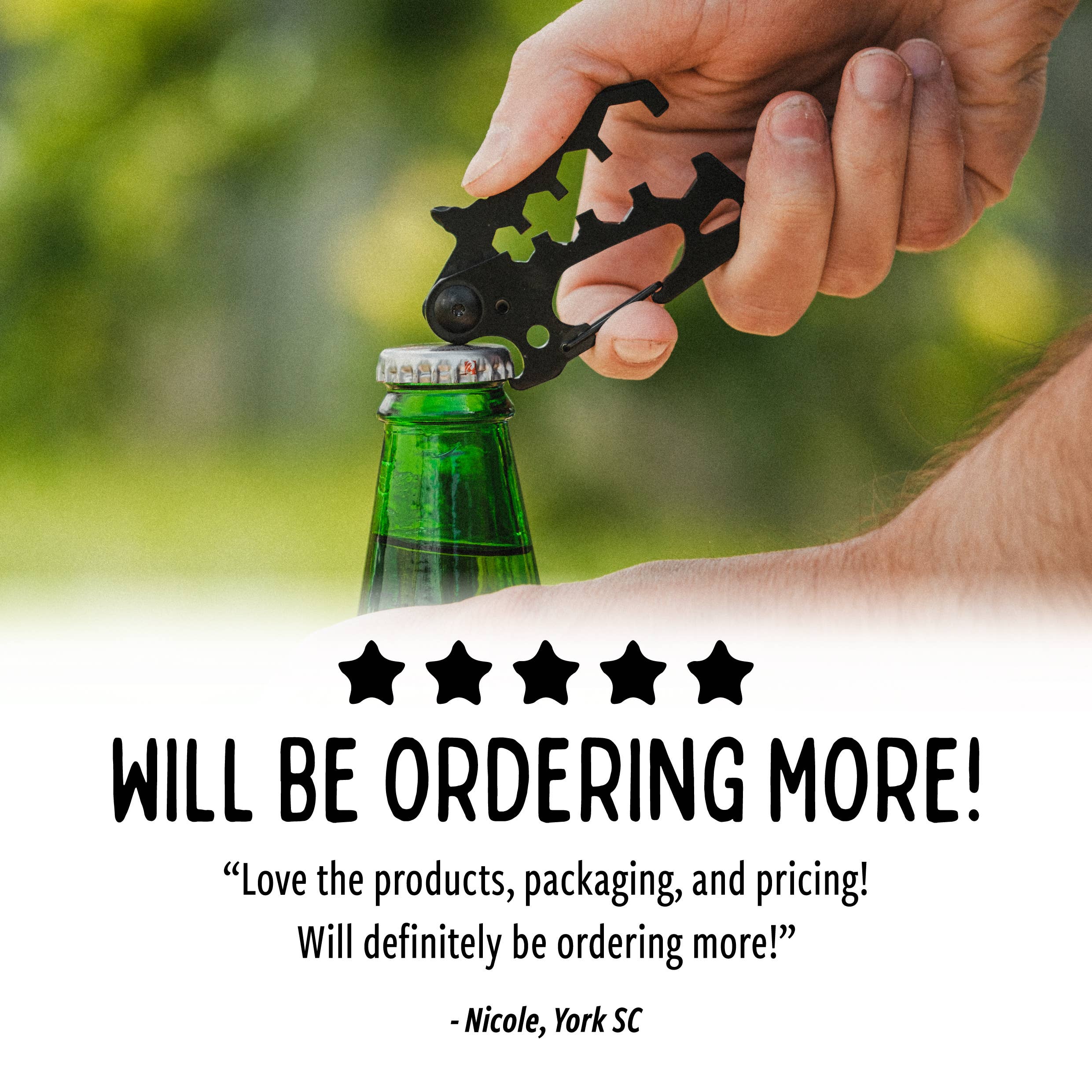 Person using a multi-tool bottle opener on a green bottle with a blurred outdoor background.