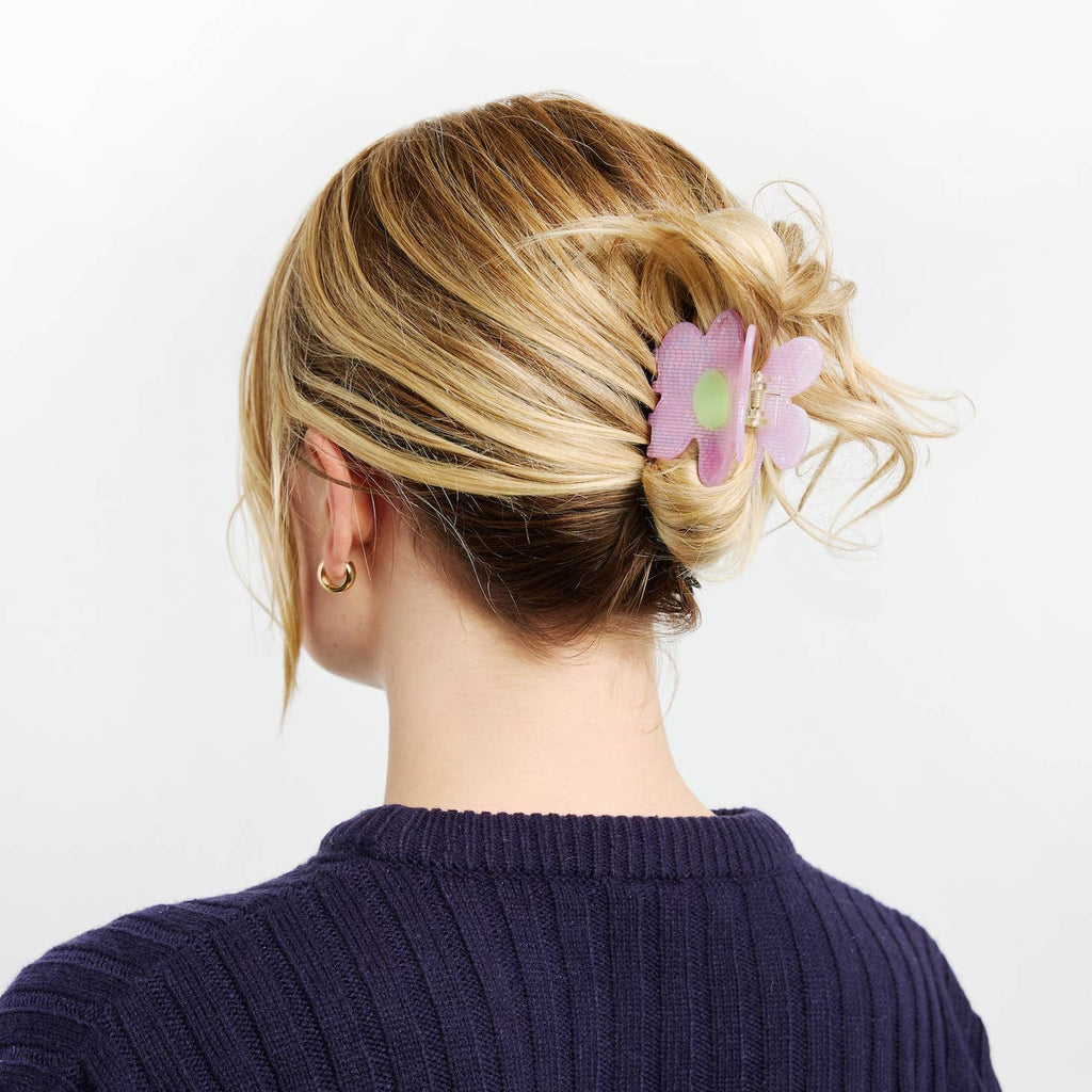A bold and bright, flower-shaped claw to add a little quirky punch to your up-do.