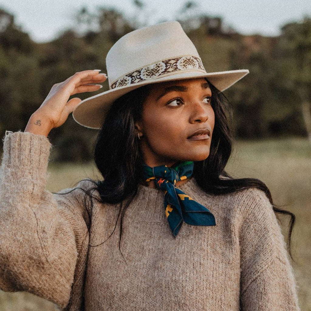 With "Endless Bloom," Lauren showcases her irreverent yet playful style with a colorful interpretation of the dichotomy of femininity, the cyclicality of life, and the natural beauty in the areas between. Her design takes cues from wildlife and traditional designs found in the Southwestern US to create mindful, wearable homage to the Southwestern landscape.