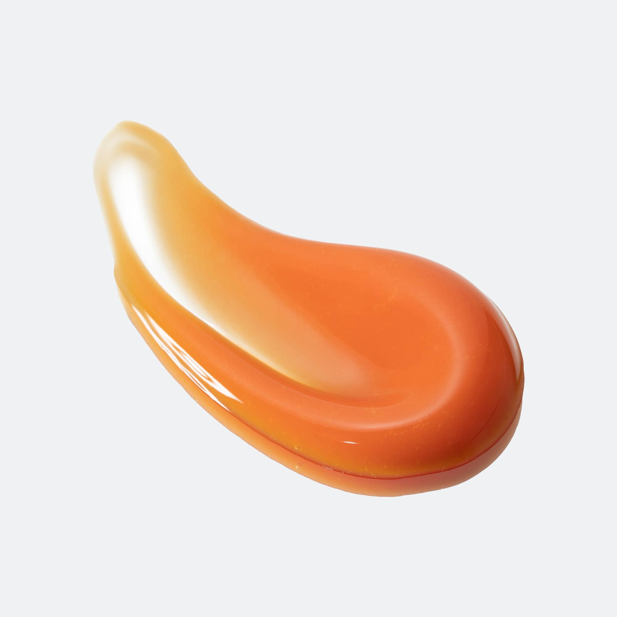 Orange teardrop-shaped object on a white background