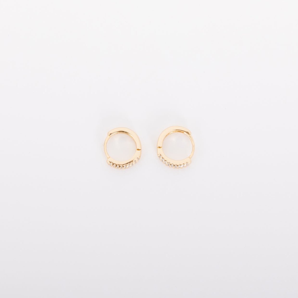 With a stunning and classic design, these earrings go with EV. ERY. THING.&nbsp; They are both timeless and on trend.&nbsp; Their&nbsp;unique click in click out clasp&nbsp;allows you to&nbsp;leave them in day and night without any discomfort.&nbsp;