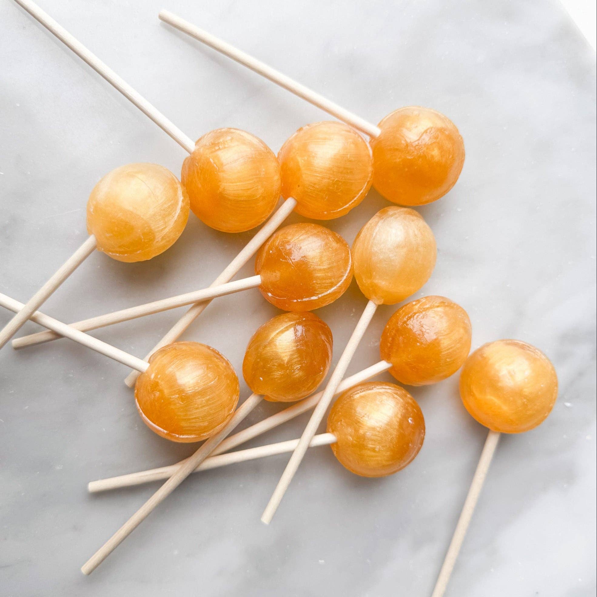 Experience the whimsical taste of our Butterbeer lollipop, inspired by the beloved classic wizardly beverage. This lollipop features a rich blend of creamy butterscotch complemented by a subtle hint of apple, creating a unique and indulgent flavor profile.

Details:

Made in the USA, our candy is all American candy.
Ingredients: sugar, glucose, water less than 2% of citric acid, food coloring, artificial/natural flavoring, vegetable glycerin.