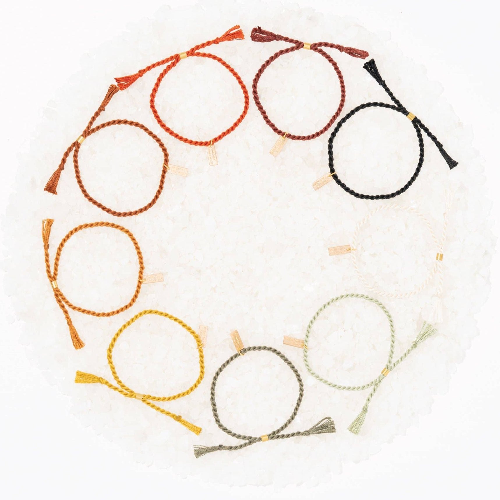 A delicate twist on Twenty Two West's crowd-favorite rope bracelets. The rope is hand spun from a single hue of cotton threads to create this soft and comfortable adjustable bracelet. Wear them individually or collect them all to mix-and-match in a complementary stack! Ink color.