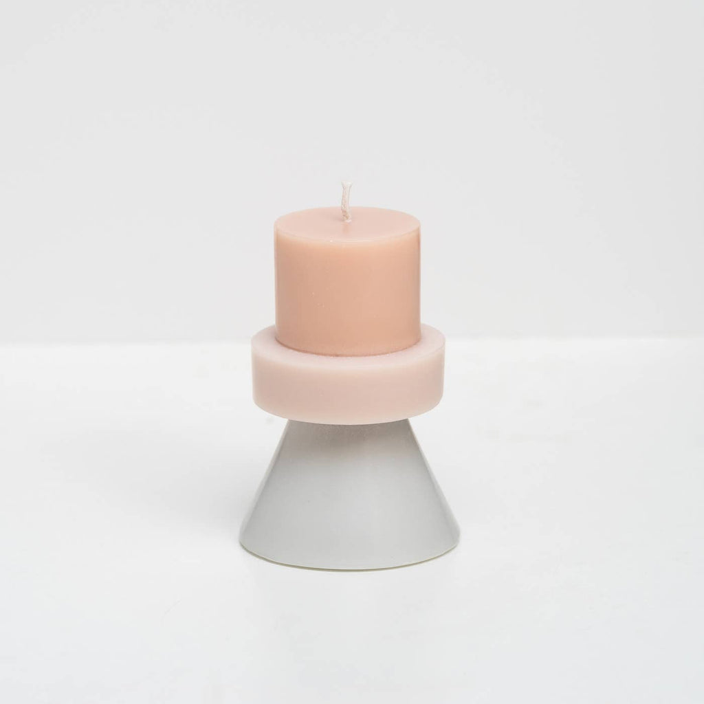 The colors of these stack candles have been carefully chosen to create a playful combination. All of the candles are individually hand poured by skilled fair trade artisans layer by layer to form the multi colored effect.        Color  Ecru / Eggnog / Cloud