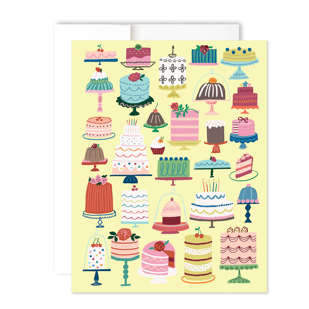 yellow card featuring a wide variety of colorful cakes