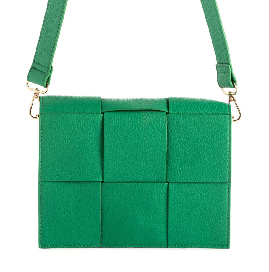 Sport your summer style with Shiraleah's Verona Shoulder Bag. Made from durable woven pebble grain PU, this purse can take your style from day to night with the switch of a handle. You can easily interchange between the braided single handle and adjustable cross-body strap.