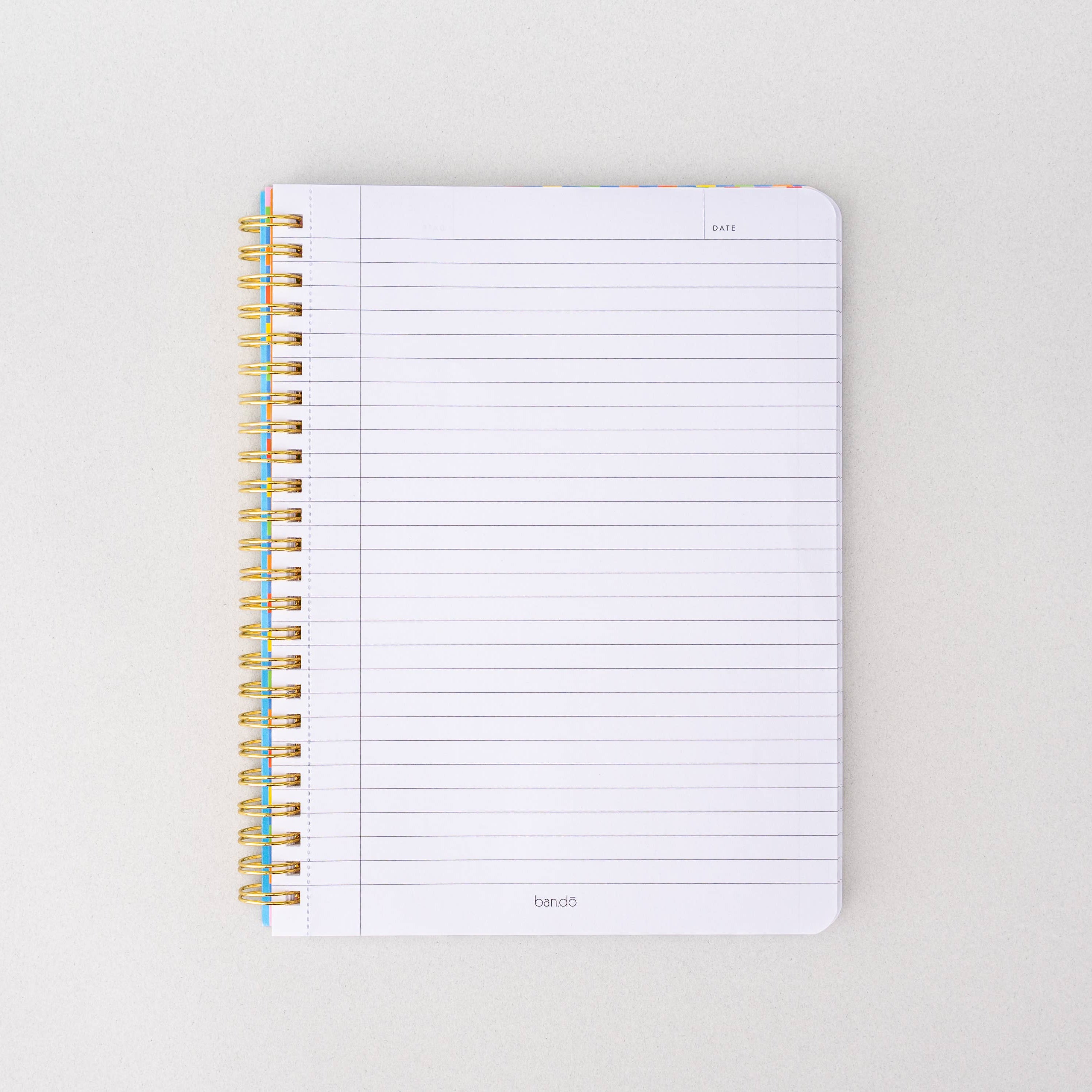 Notebook with spiral binding on a light gray background
