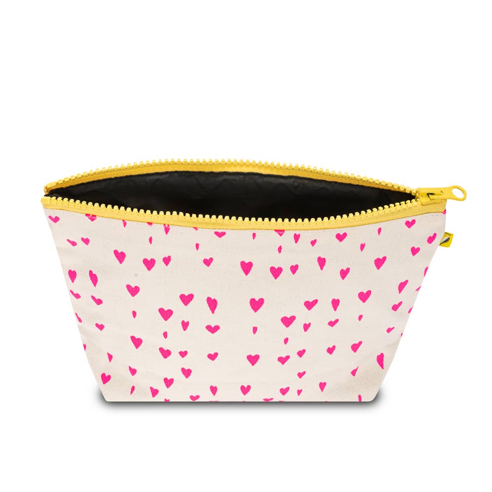The medium everything pouch, to keep all the things organized. Like cords, earbuds, an extra pair of socks. Solid ykk zipper. Rpet (recycled water bottle) lining. All Fluf products are clean and safe, sustainably made and designed to make your life easier. Tiny Hearts
