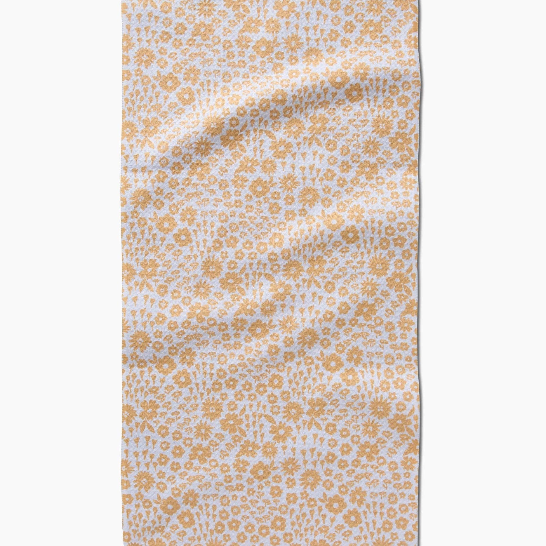Floral patterned towel on a white background Tea Towel