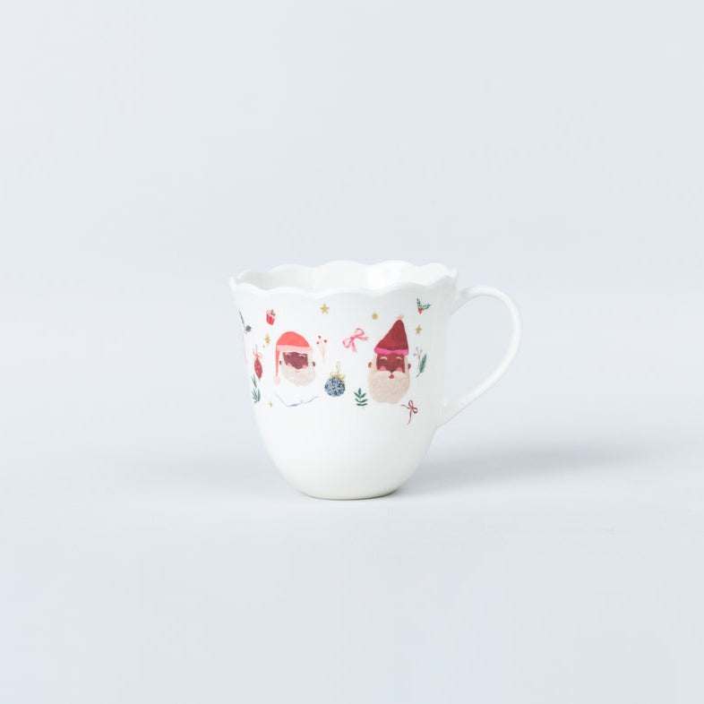 From the twinkle in its golden eye to its festive holly berry design, these Fancy Christmas Collection Cups are sure to spread holiday cheer! So cozy up to a hot cocoa and enjoy the season with a cup that radiates personality and style. Illustrated with Santas of different ethnicities. 