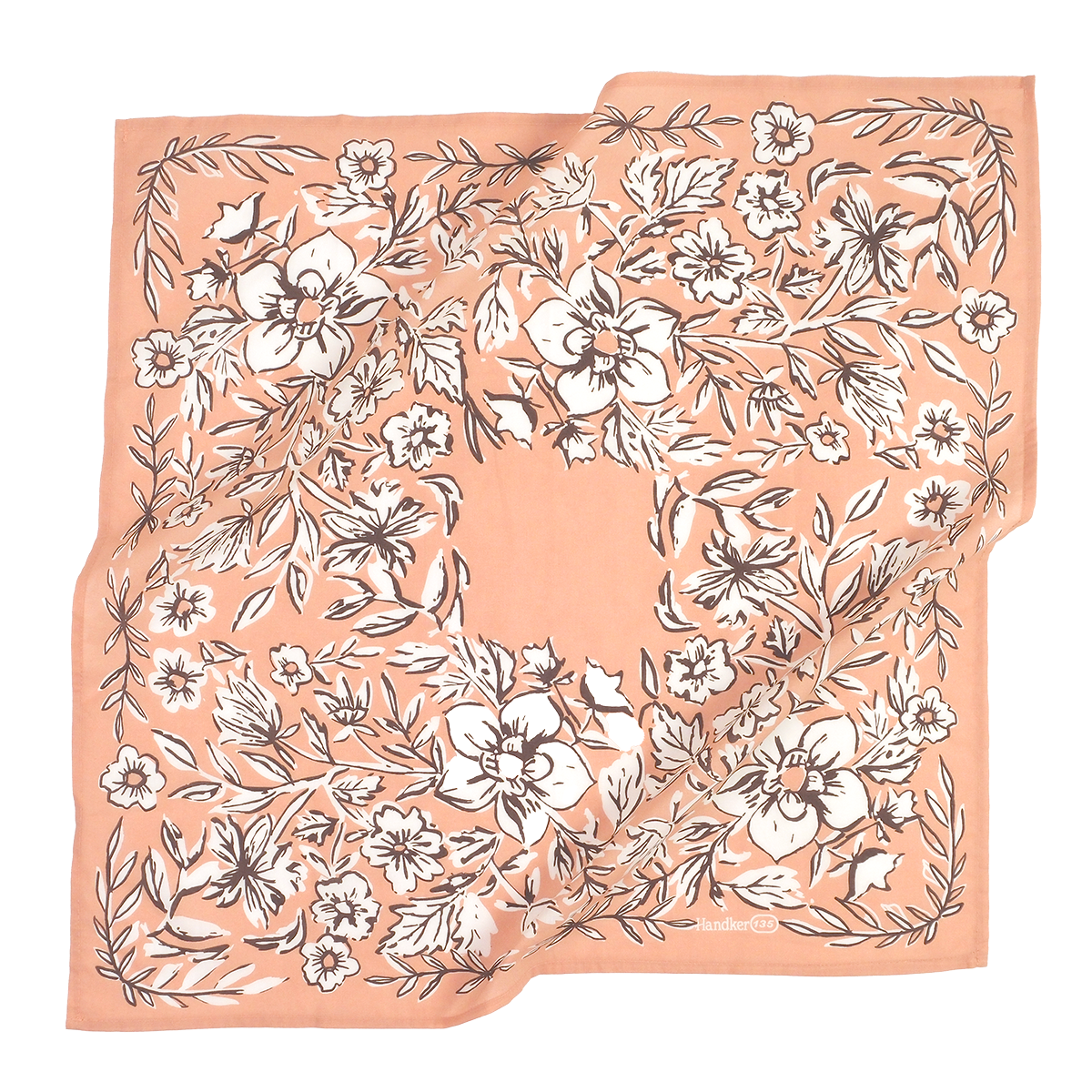 Floral patterned bandana on a peach background