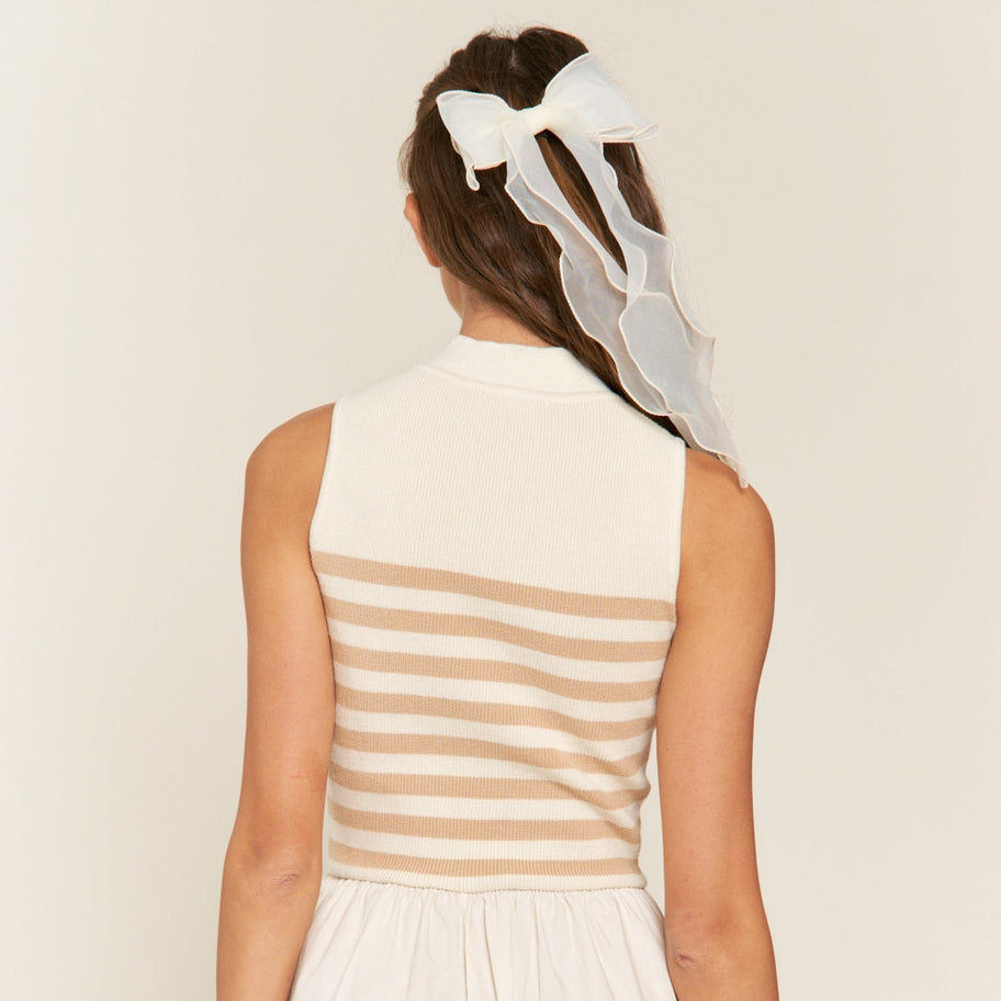Get ready to strut your stuff in this Beige Striped Sleeveless Mock-Neck Maxi Dress. With its bold stripes and stylish mock-neck design, you'll be turning heads wherever you go. Perfect for a sunny day out or a night on the town. Express your unique style with this fun and chic dress!
Mock neckline, Sleeveless bodice, Fitted stripe top, Loose fit bottom, Maxi/ankle length dress, Self: 50% Viscose, 28%Polyester, 22% Nylon, Contrast: 100% Cotton