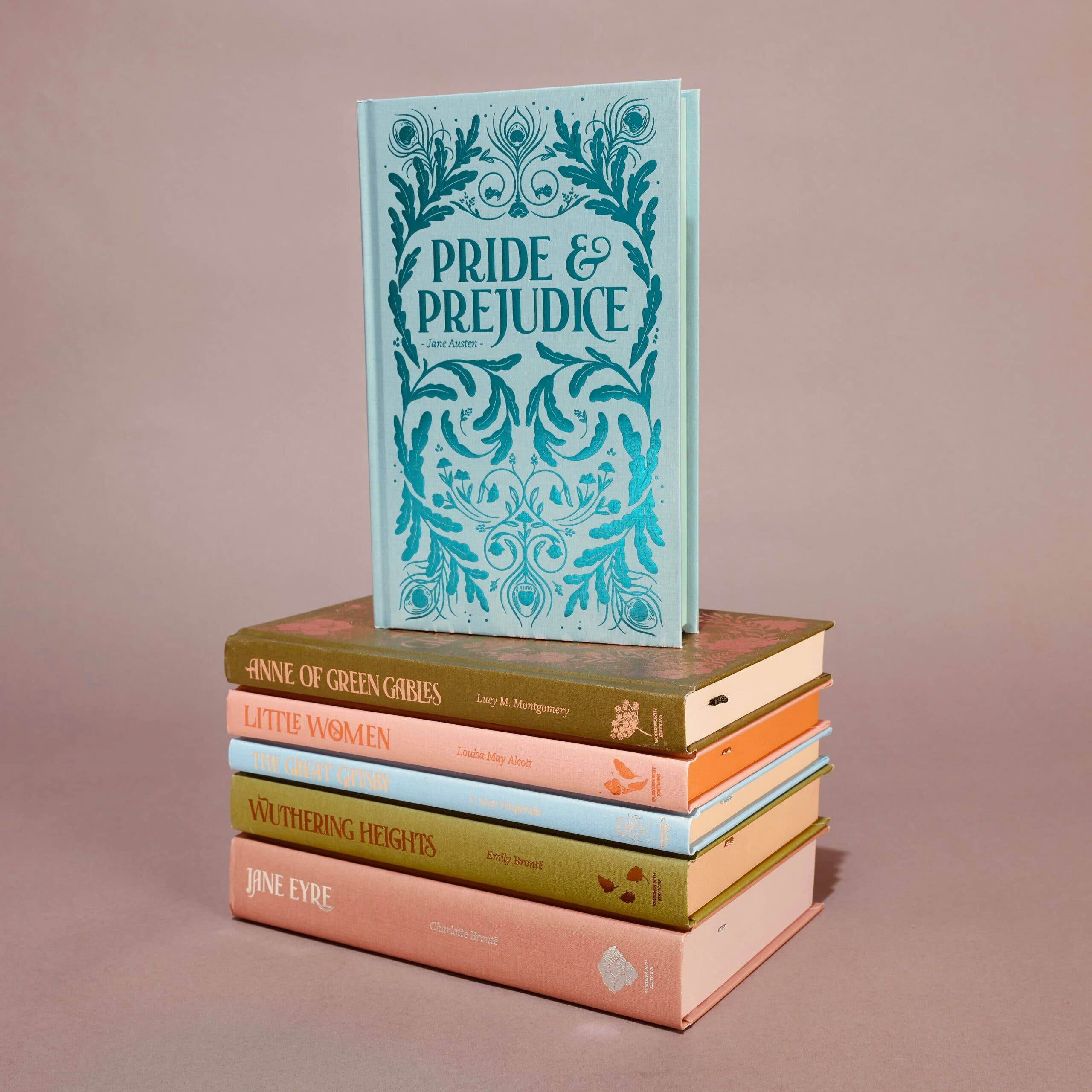 Stack of books with 'Pride & Prejudice' on top against a beige background