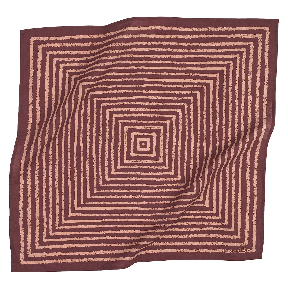 Brown and pink patterned fabric square on a white background