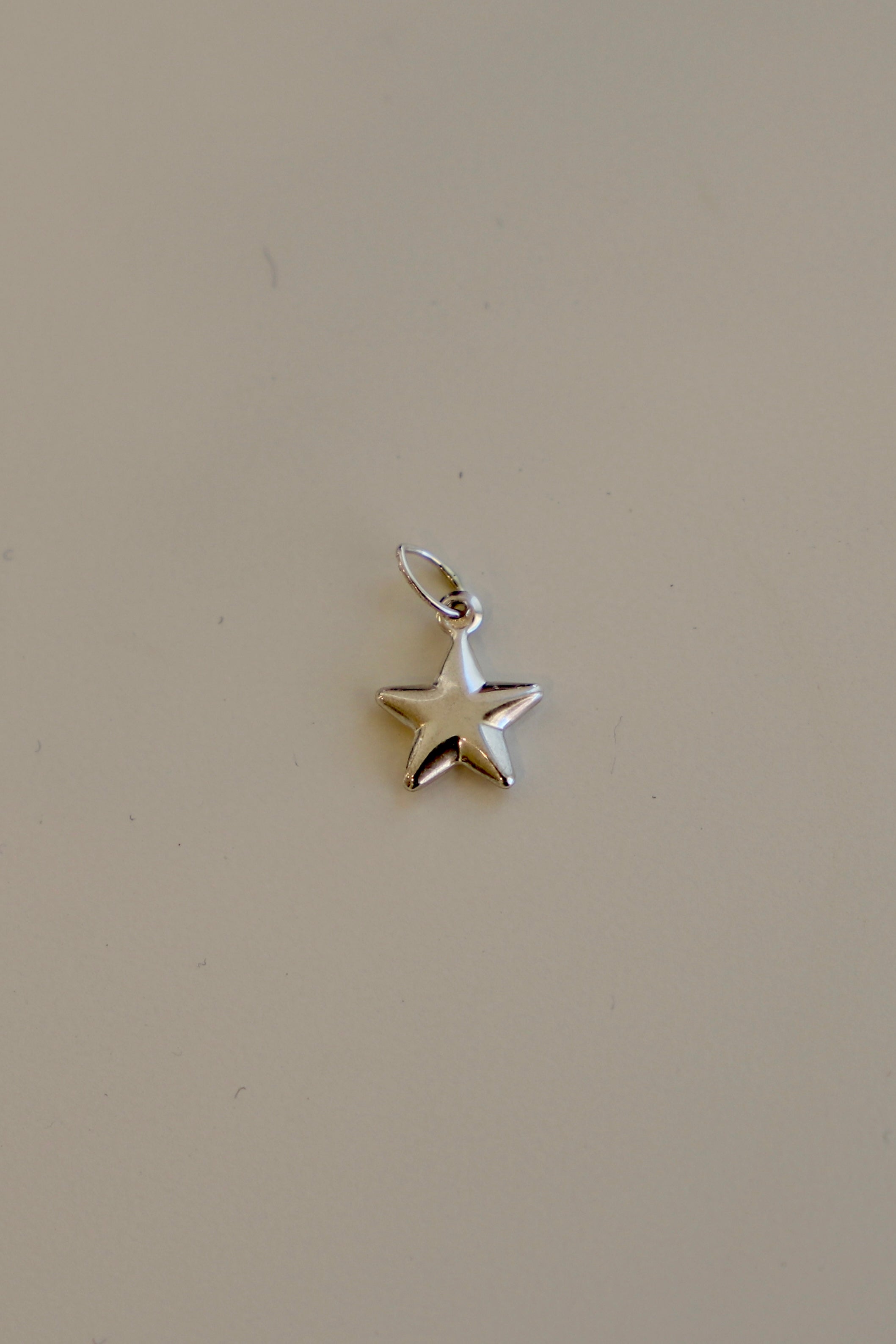 SILVER STAR CHARM