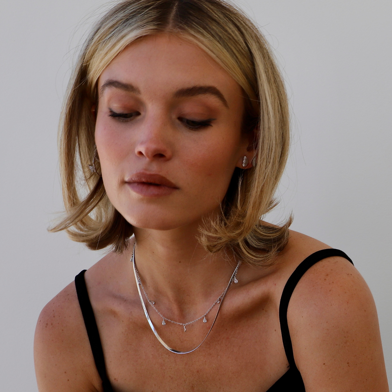 If you are looking to add a bold piece to your jewelry collection that can still be worn everyday, this is your necklace! Featuring a thick herringbone chain with a 2" extender, this necklace is one of our staples!