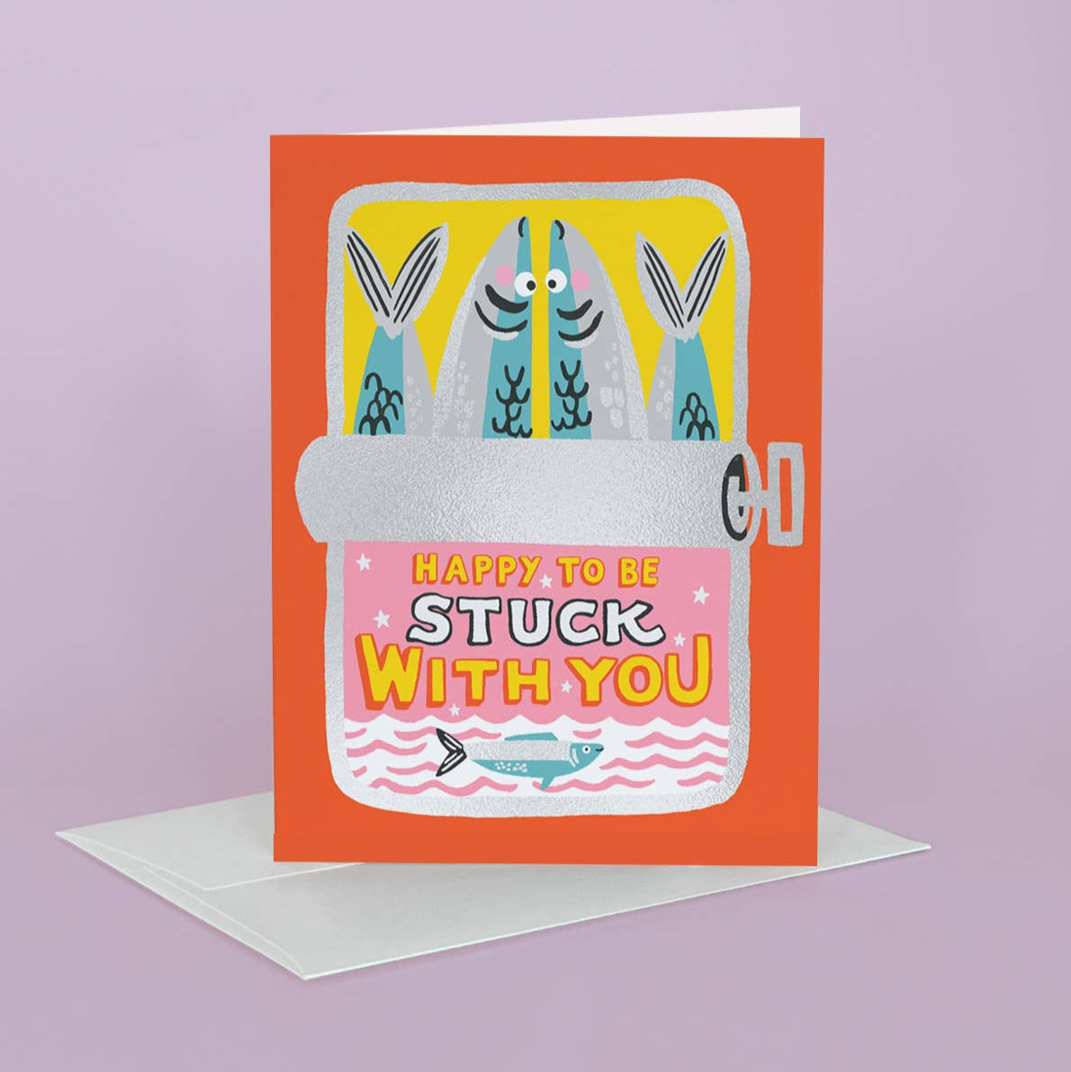 Greeting card with cartoon fish design and text on a purple background