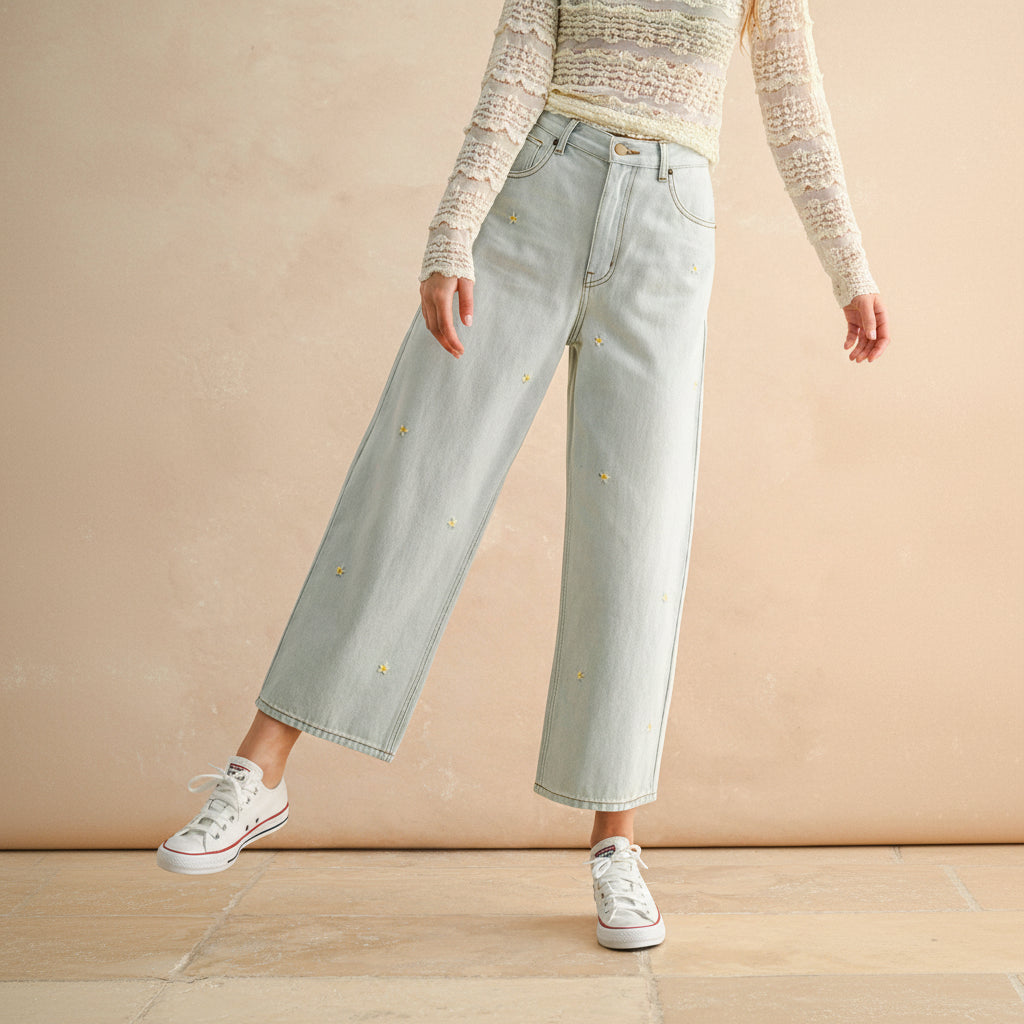 Celebrate your unique style with these Flower Embroidery Pants in classic denim. Delicate floral details add a touch of artistry to an everyday essential, creating a look that's both comfortable and expressive. Perfect for those who want to bring a little beauty into their wardrobe.