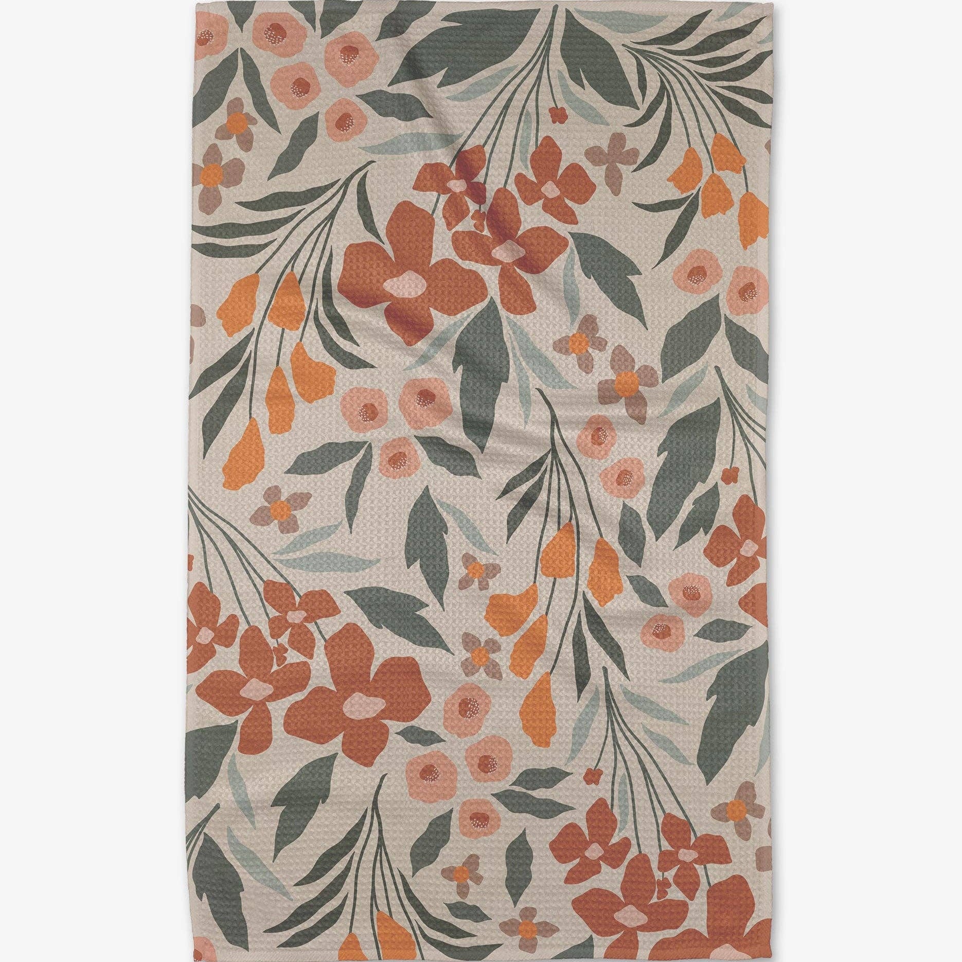 Floral patterned rug with orange, green, and pink flowers on a beige background