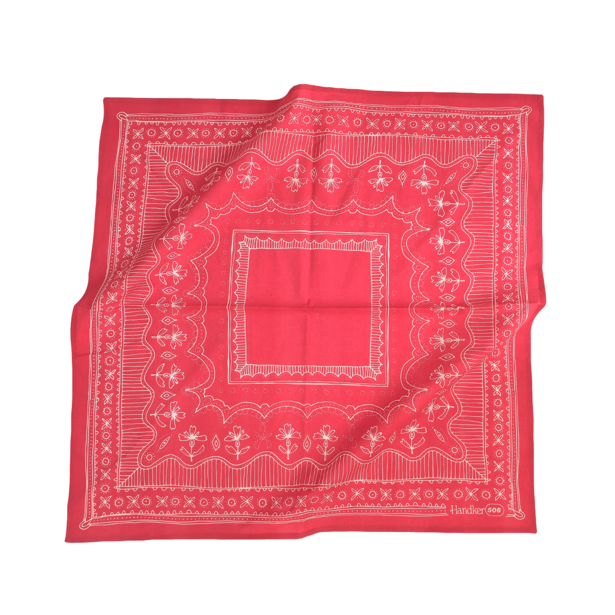 Red bandana with white patterns on a white background