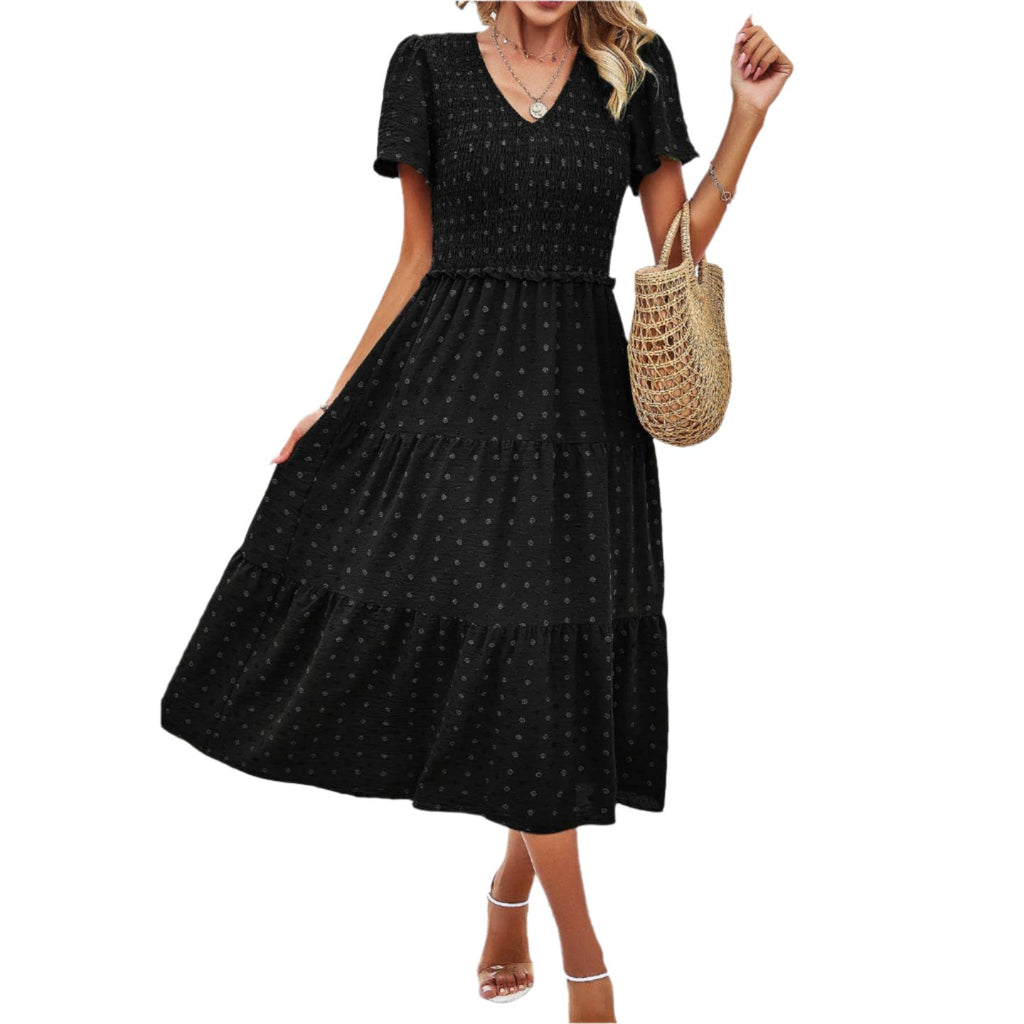 Get ready to turn heads in this Smocked V Neck Midi Dress in a gorgeous shade of green. The V neck and smocked details add a touch of playfulness to this classic silhouette. Perfect for any event, this dress will have you feeling confident and stylish.