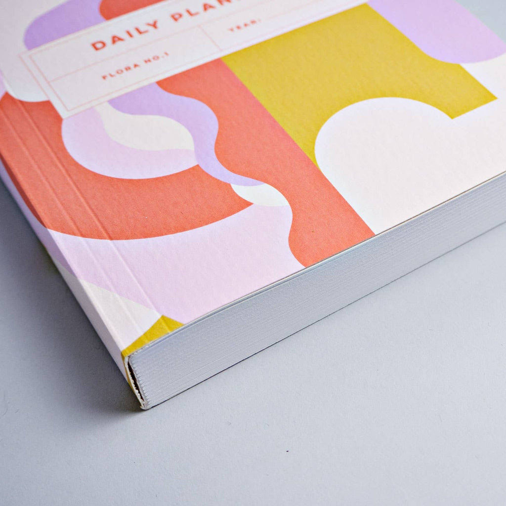 This is a 320 page undated layflat daily planner. It has a day per page for week days, and a page for the weekend - there's 52 weeks in total and it comes with a matching bookmark.